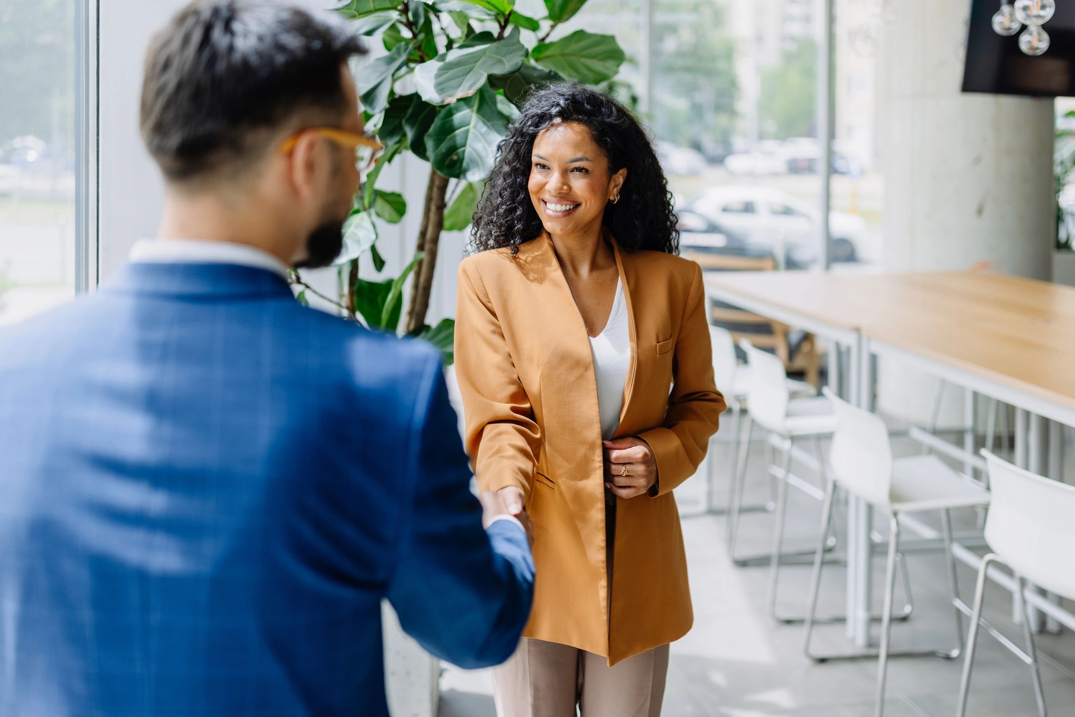 Business handshake representing professional debt recovery